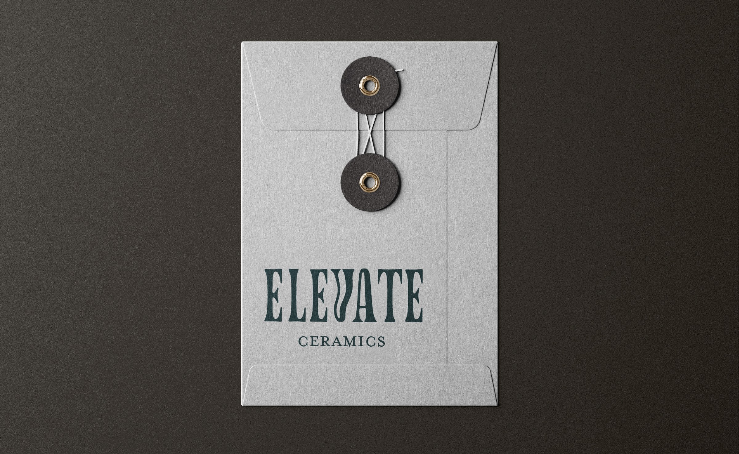 Elevate Ceramics identity on a hanging tag.